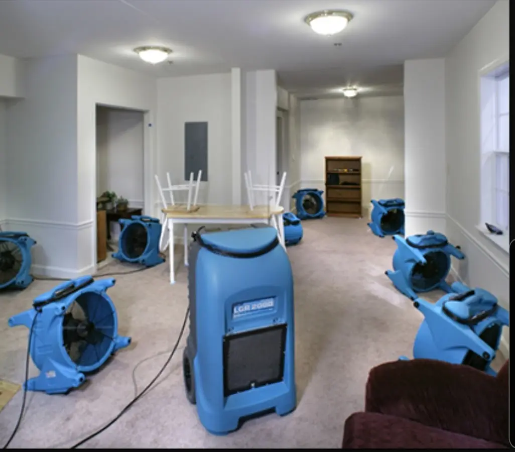 Air movers and dehumidifier setup for Water Damage Restoration in Ocean City